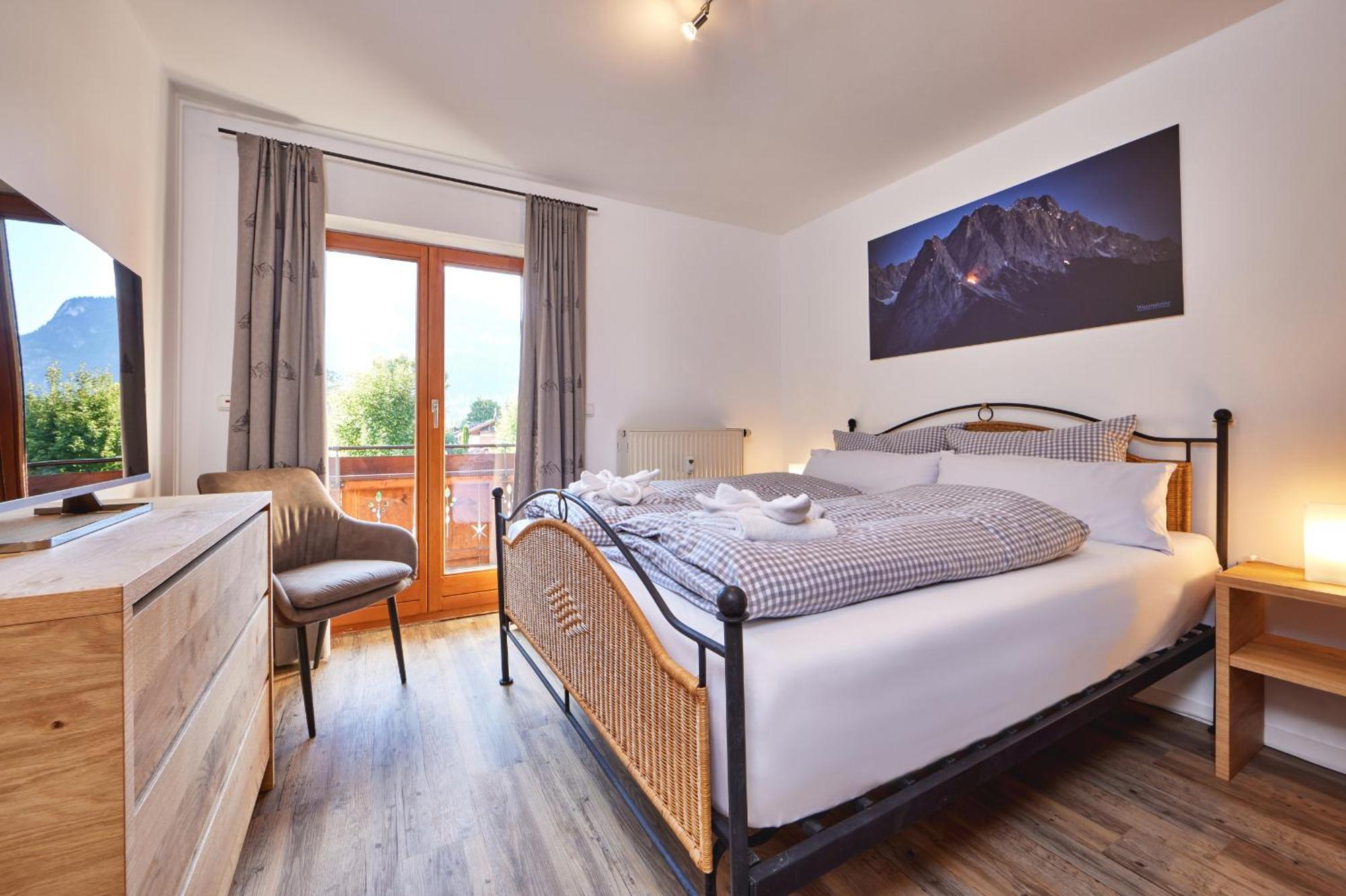 Haus Alpklang Apartment การ์มิช-พาร์เทนเคียร์เชน ภายนอก รูปภาพ
